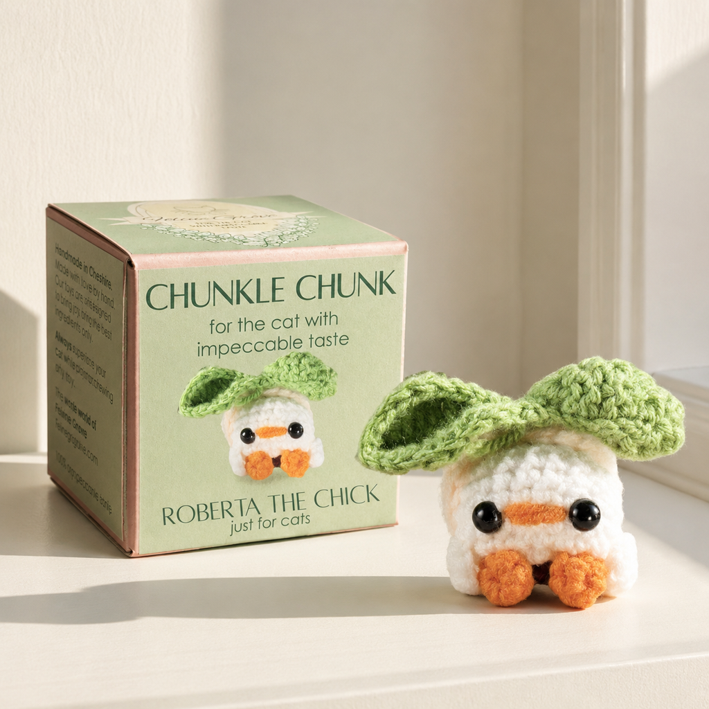 Cat toy hen in a peach costume. Roberta the Hen Chunkle Chunk cat toy with packaging by Chunkle & Puff, artisan botanical cat toy infused with Miracle Nip