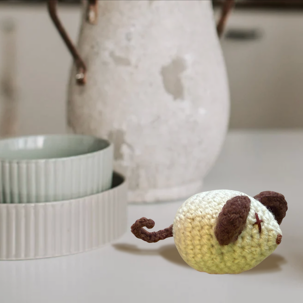 Mouse shaped woven cat toy styled with ceramic ramekins and vase, Miracle Nip botanical catnip alternative by Chunkle and Puff France collection