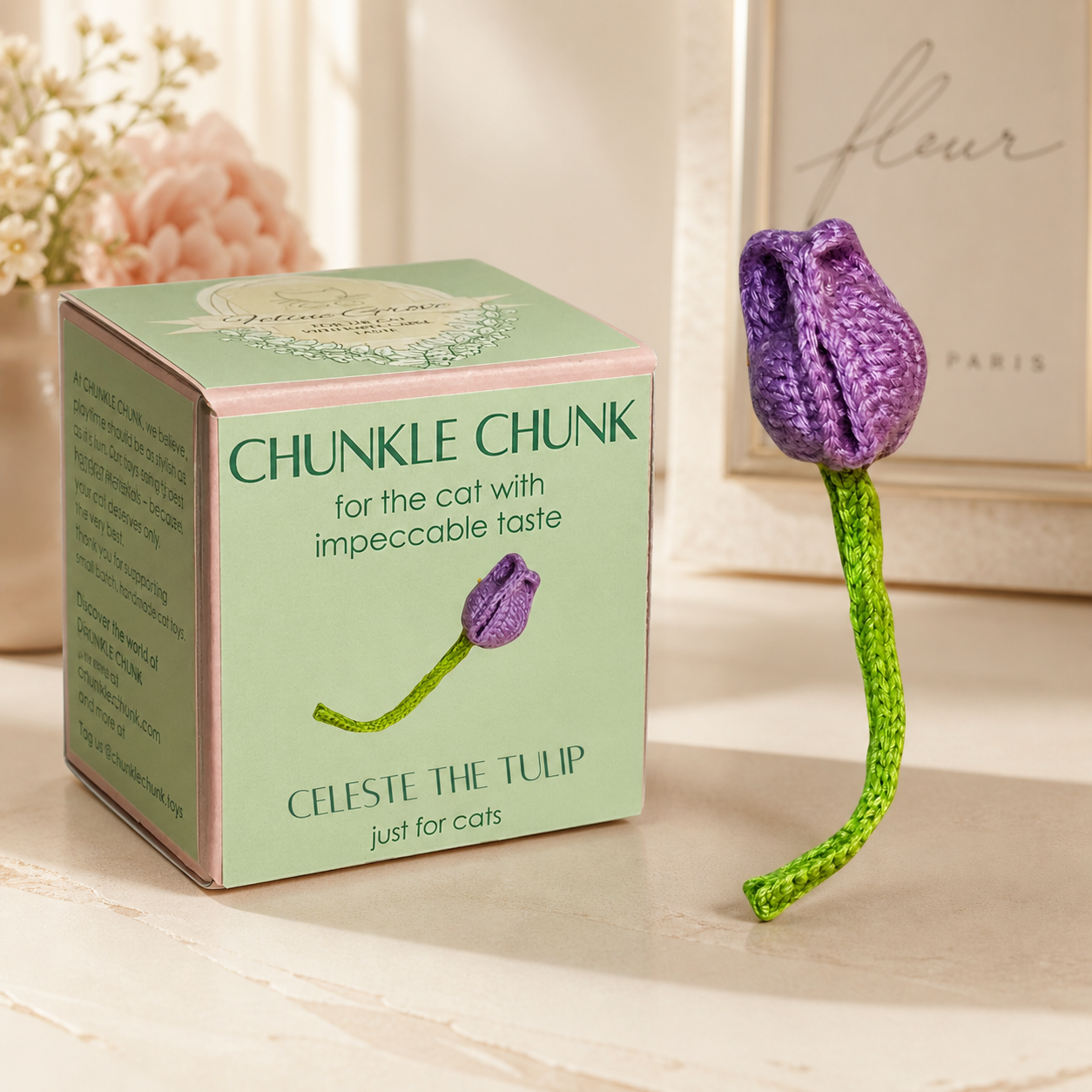 Roselle the Tulip Chunkle & Puff cat toy with branded packaging box, purple woven botanical design, luxury cat toy for batting and carrying, botanical infused independent play cat toy