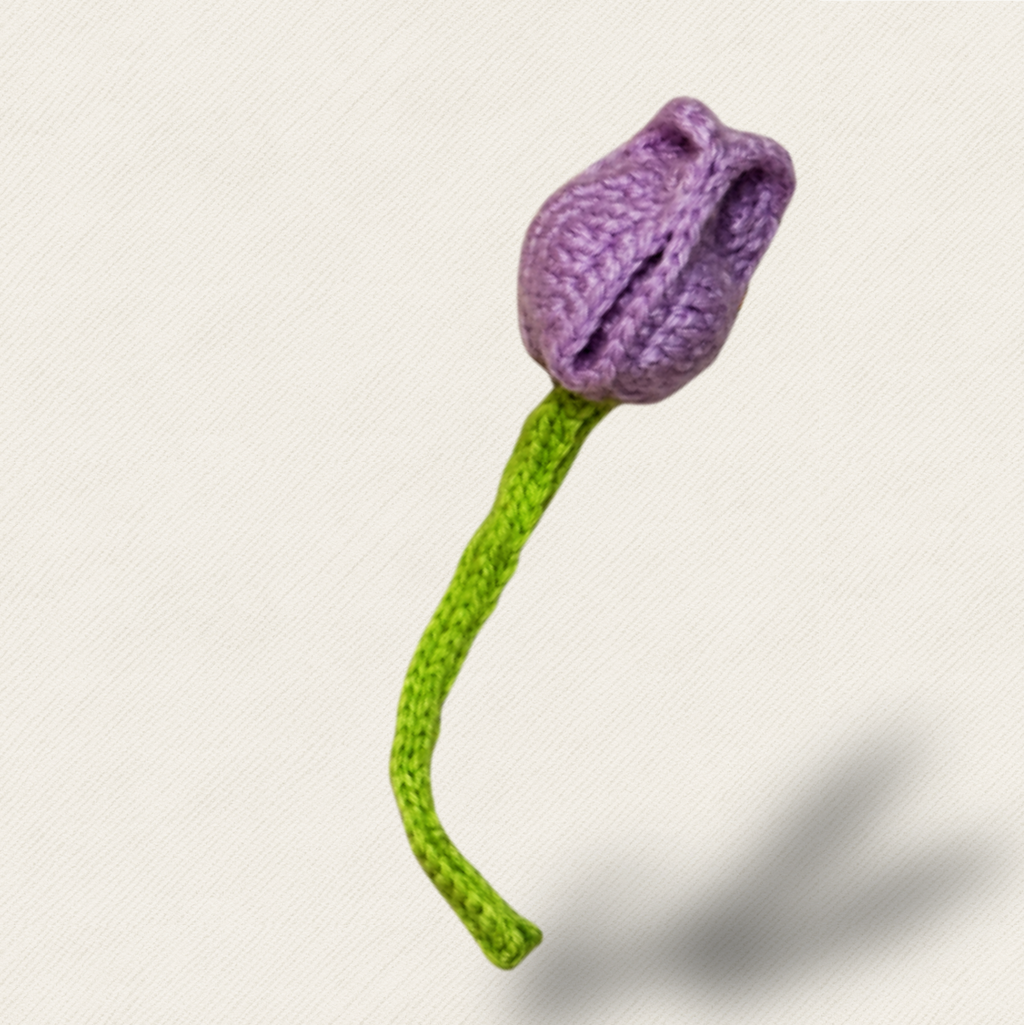 Roselle the Tulip Chunkle & Puff cat toy, purple woven flower with green stem on neutral background, luxury cat toy for batting and carrying, botanical infused independent play cat toy