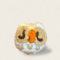 Cat Toy Owl Hero Image. Snow owl shaped woven cat toy front view showing orange beak and brown eye detail, Miracle Nip botanical catnip alternative by Feline Grove.