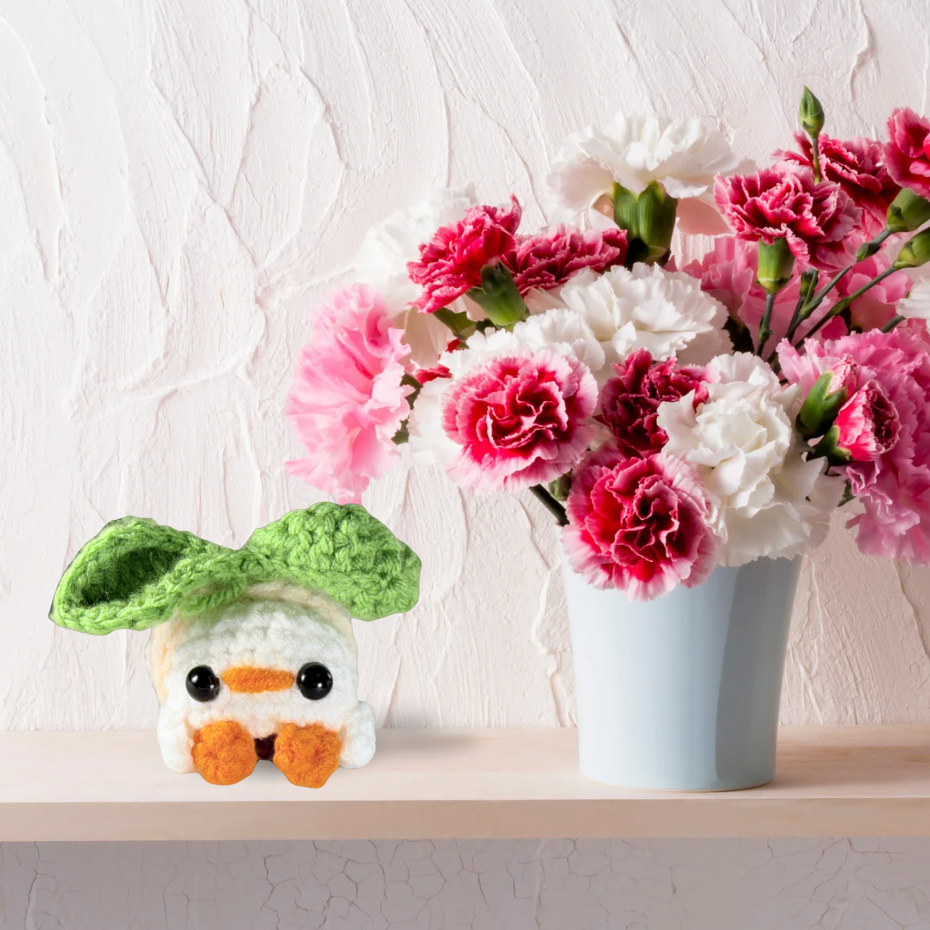 Roberta the Hen artisan Chunkle cat toy styled beside vase, botanical cat toy infused with Miracle Nip by Chunkle & Puff