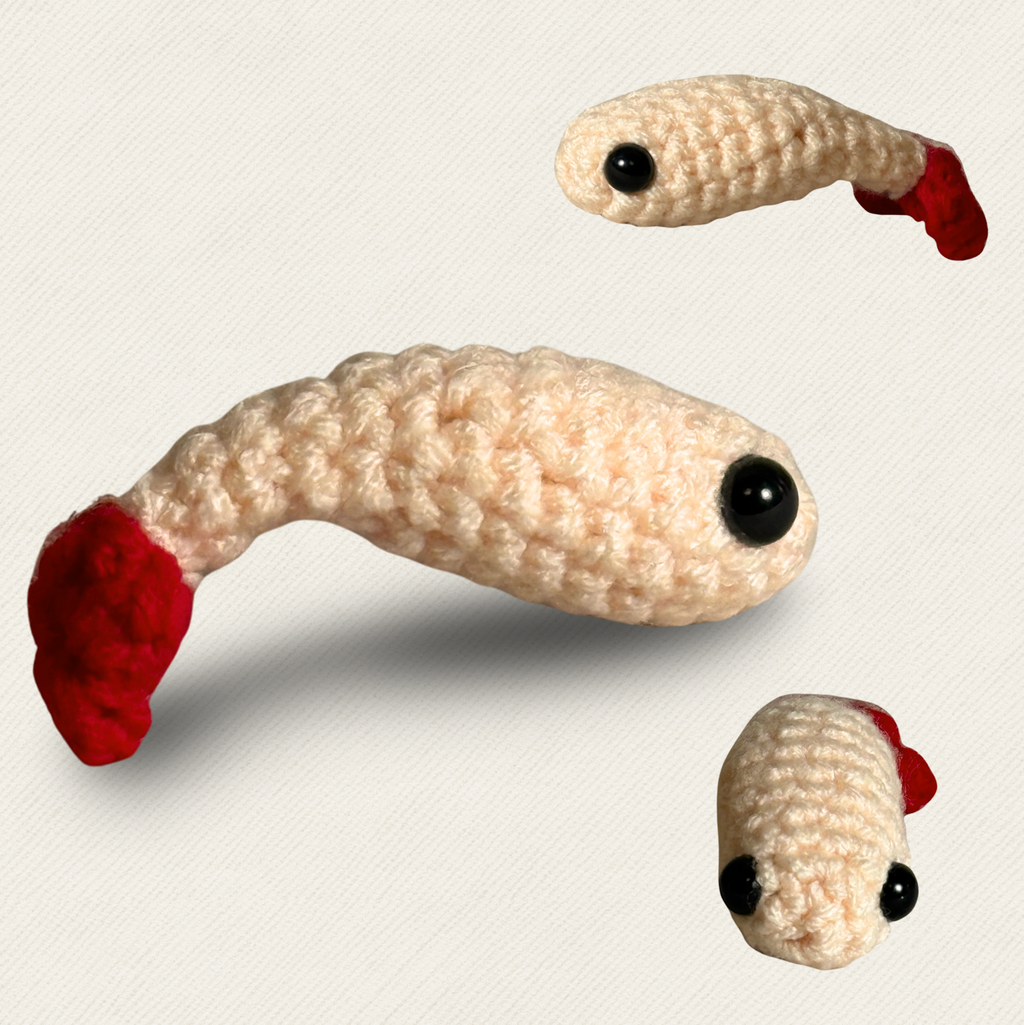 Multiple views of woven shrimp cat toy with curved ivory body and red tail tip, textured yarn surface shown from different angles, compact lightweight form for batting and carrying, Chunkle & Puff toy with Miracle Nip