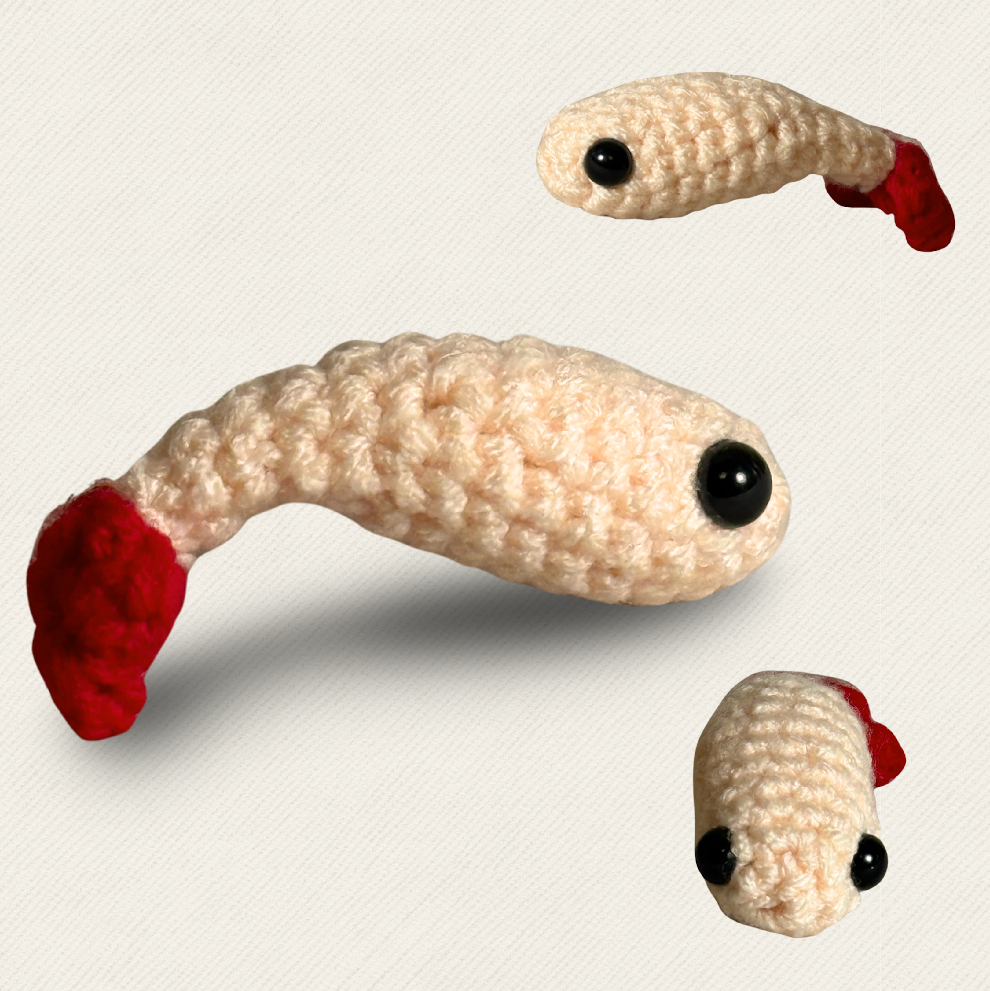 Multiple views of woven shrimp cat toy with curved ivory body and red tail tip, textured yarn surface shown from different angles, compact lightweight form for batting and carrying, Chunkle & Puff toy with Miracle Nip