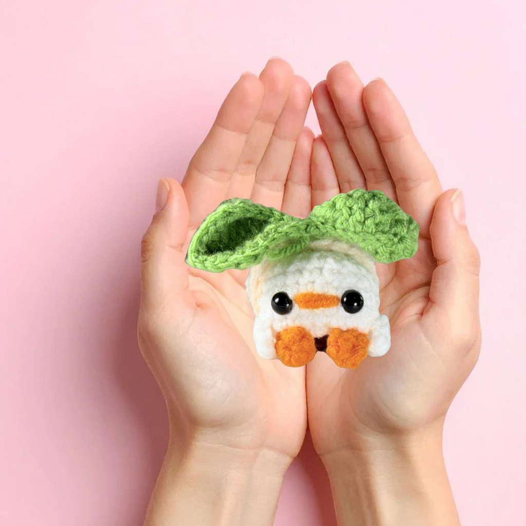 Roberta the Hen Chunkle cat toy in hands showing size, infused with Miracle Nip by Chunkle & Puff for independent play